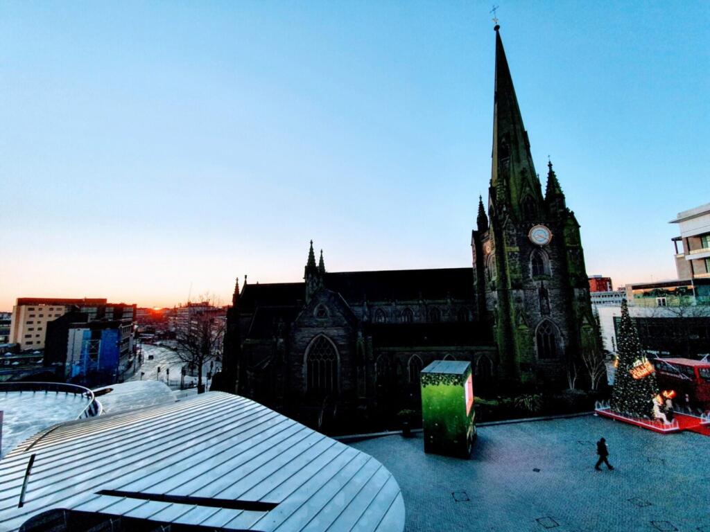 The sun coming up near St Martin's Church in Birmingham.