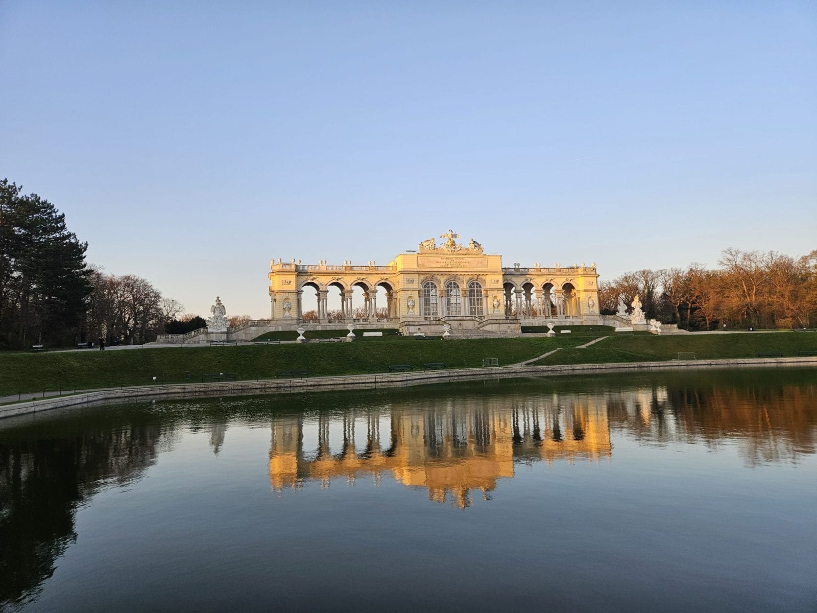Gloriette reflected in the northern basin at sunrise